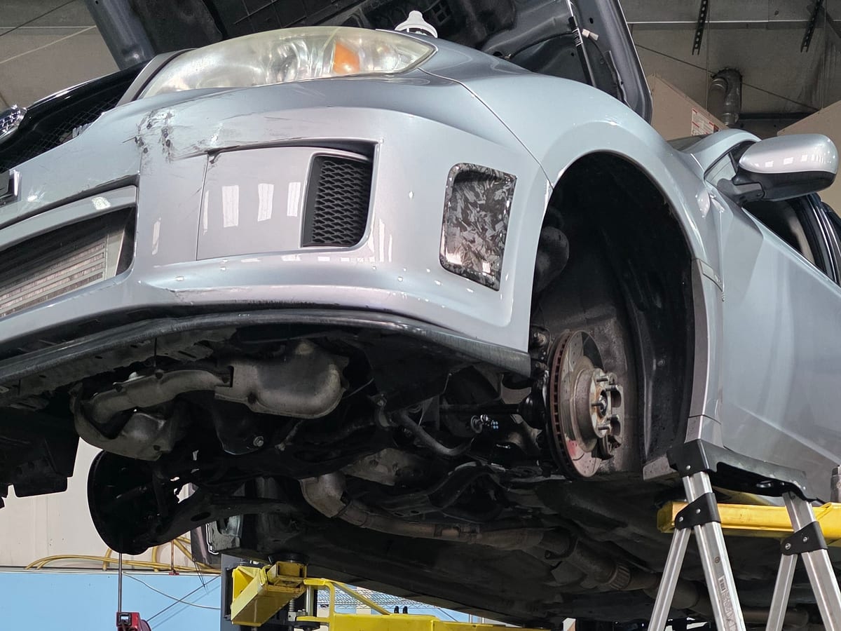Front suspension stripped down on the lift