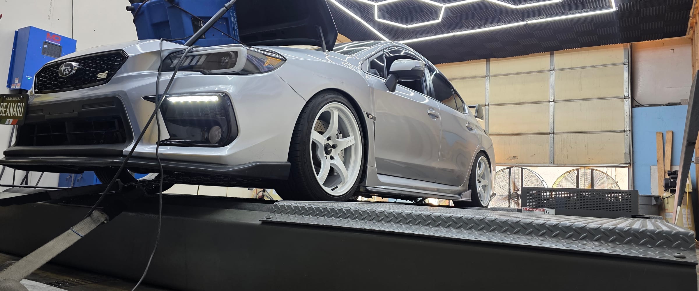 Subaru WRX STI strapped to the in-house Mustang AWD dyno